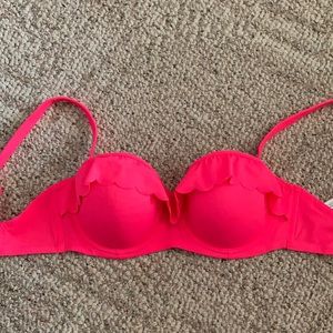 Ruffle trim under wire bikini top.